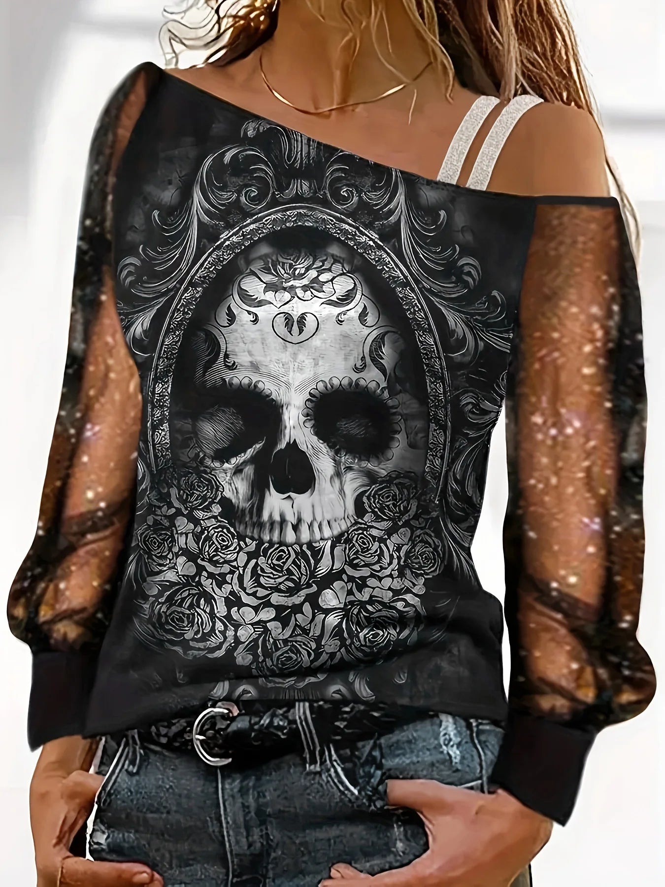 Camiseta informal de cuello torcido con un solo hombro para mujer, blusa de manga larga brillante con perspectiva y calaveras, jersey de calle de color liso